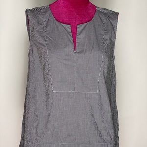 Sleeveless tunic top.